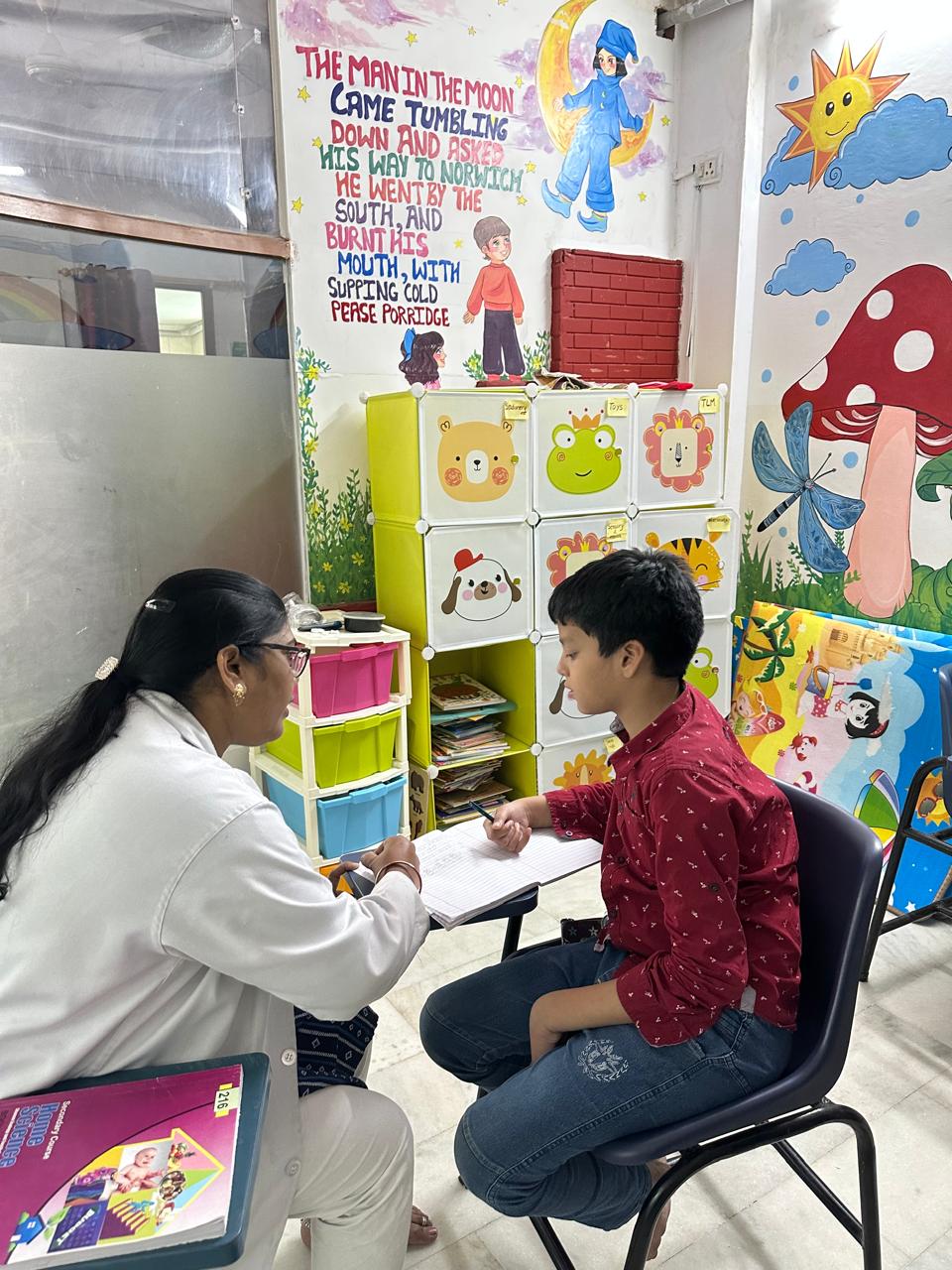 Children in a therapy session at Adhyayan